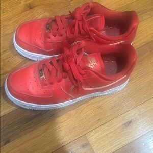 Nike Air Force 1 barely worn Red Sneakers with Modern Design